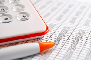 calculator and stationery items on the table